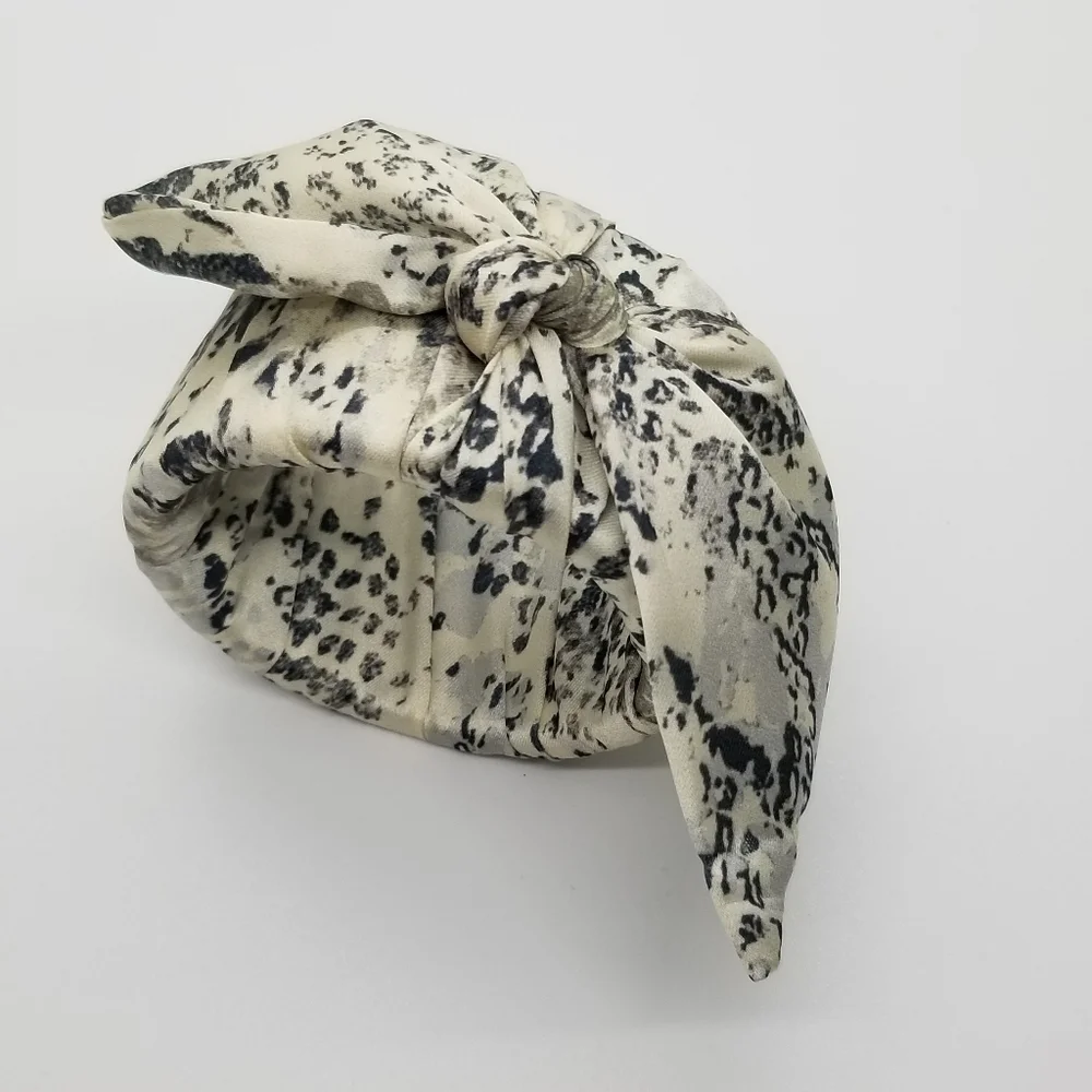 fabric wrapped hinged bangle with bow